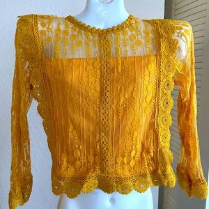 Lace Ruffle elegant  long sky top can be worn with any bottom of your choice .